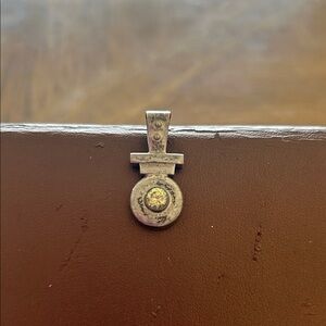 Sterling Silver Round Pendant with Yellow Stone